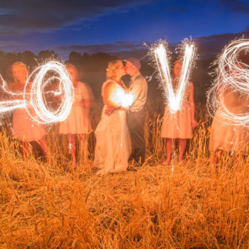 Summer wedding fun with LOVE and sparklers in Grafton, ON